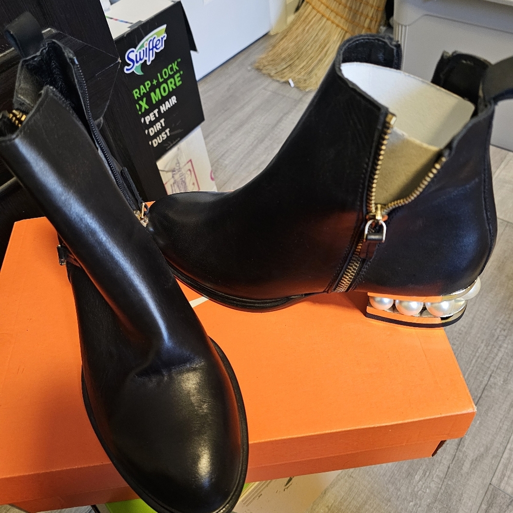Black leather boots with pearl heel  size 40 .  Do not have original box.